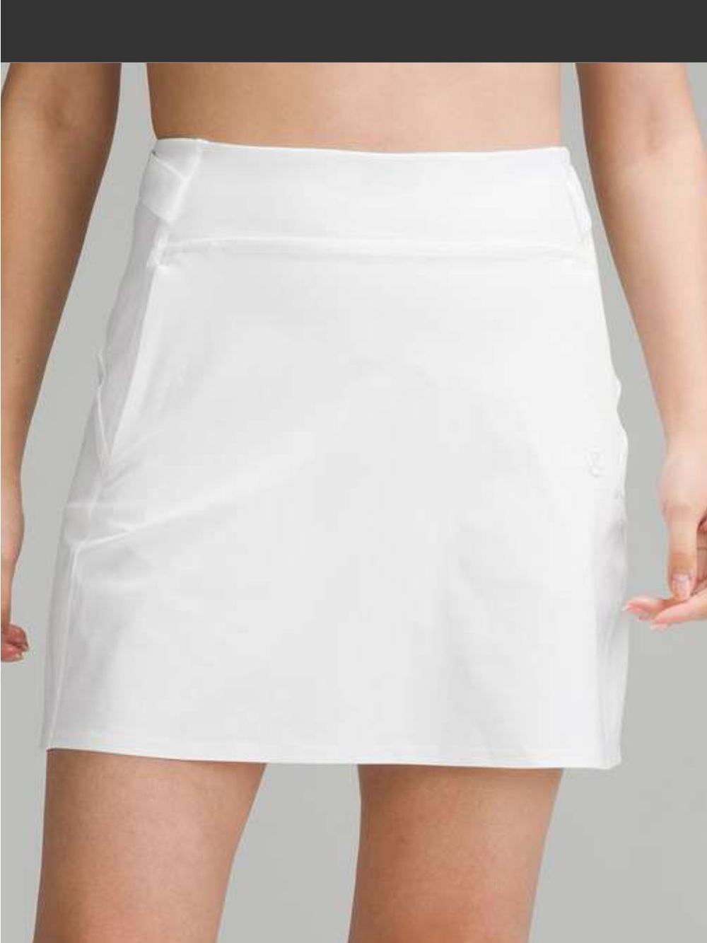 Lululemon Warpstreme Multi-Pocket High-Rise Golf Skirt, size 4
